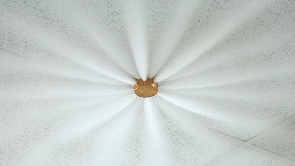 A gaseous fire sprinkler system in action